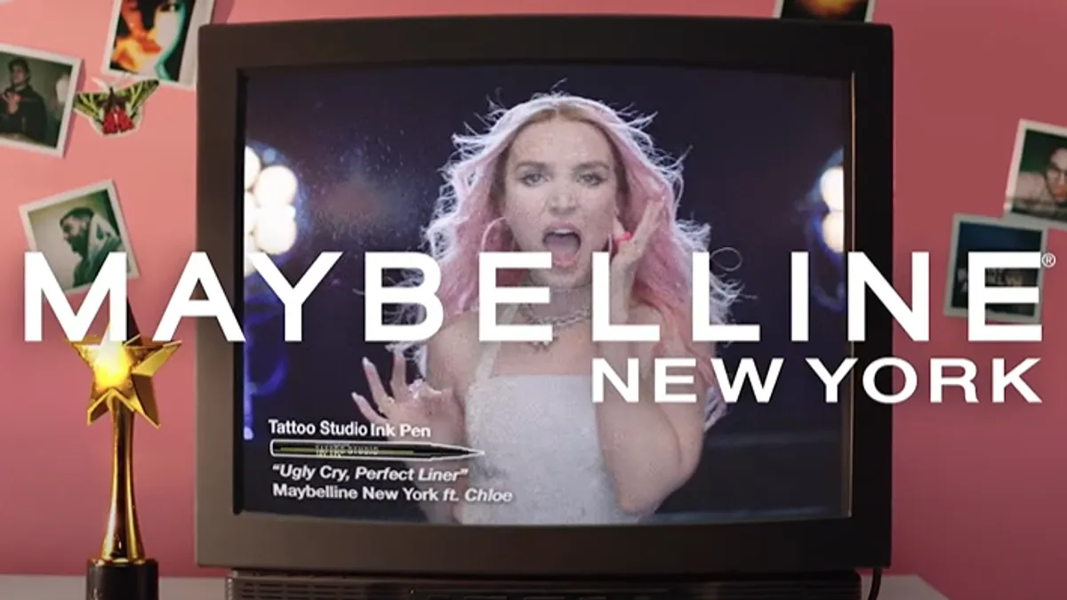 An image pulled from Maybelline New York's campaign and music video, "Ugly Cry, Perfect Liner," staring SNL actor Chloe Fineman.