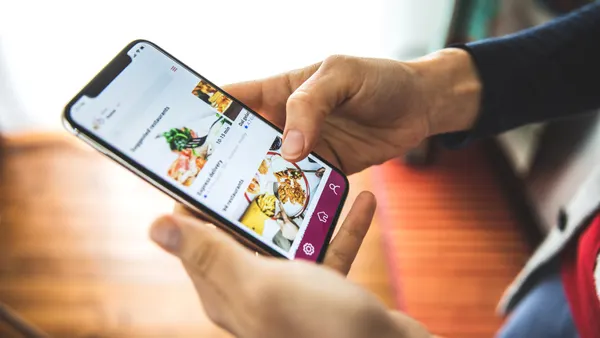 A customers uses an app on their phone.