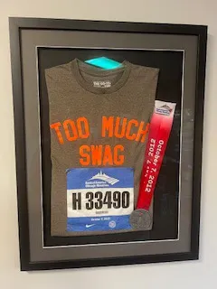 Araco Jr.’s shirt, bib and metal from running the Chicago Marathon.