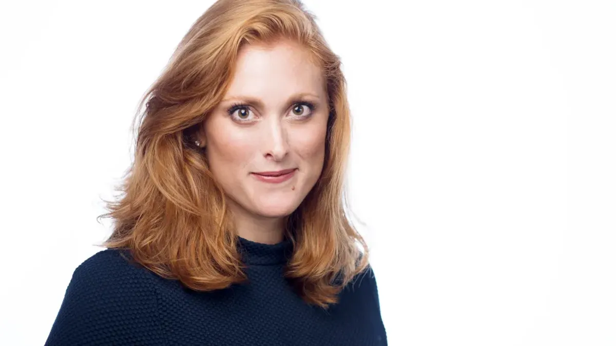 A headshot of Savannah Sachs on a white background.