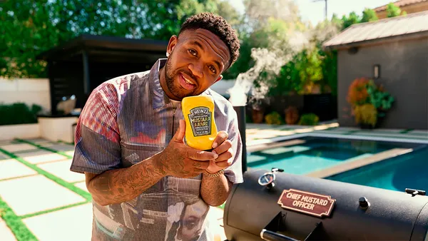 Music producer Mustard poses with Heinz product as part of a 2025 campaign.