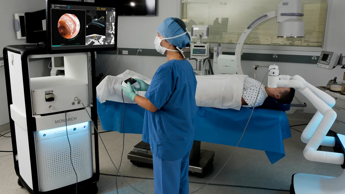 Monarch Bronchoscopy - Physician Using Controller to Drive Monarch Platform