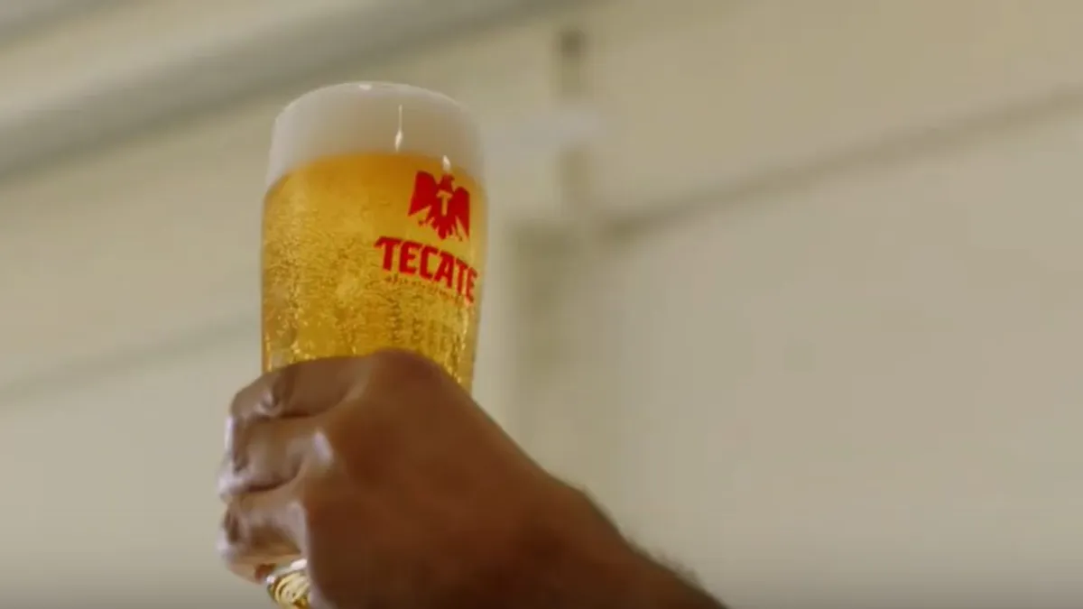 Screenshot of a video ad from Tecate's 'Mexico is in Us' campaign that launched on Feb. 13, part of the brand's repositioning efforts