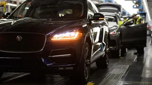 Vehicles are checked before moving to the next stage of production at the Jaguar Land Rover factory on March 1, 2017 in Solihull, England.