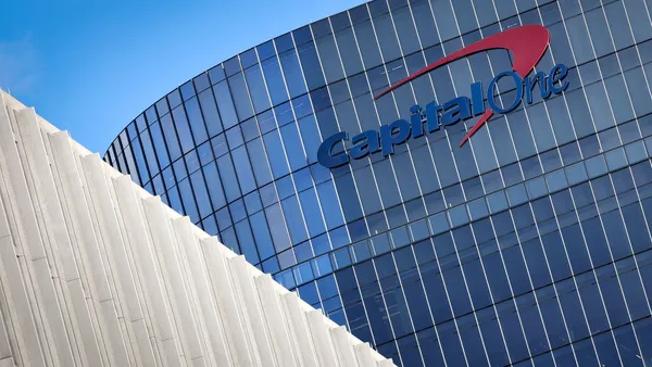 The Capital One logo is displayed on the side of its headquarters in McLean, Va.