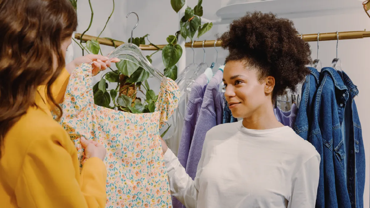 Girls looking at clothing