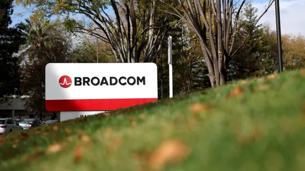 A sign with the Broadcom corporate logo is posted in front of a Broadcom office on December 12, 2024 in San Jose, California.