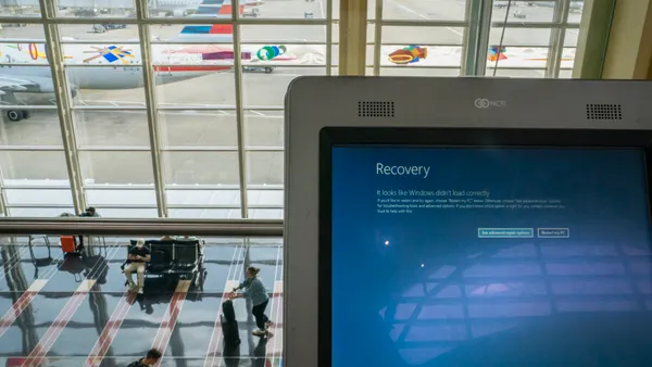 a computer screen in an airport shows an error message