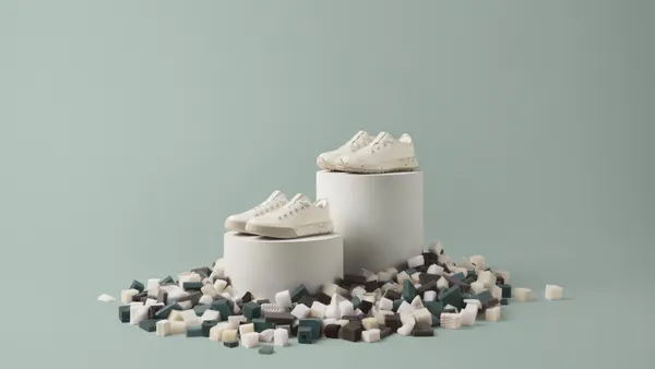 A picture of the Allbirds Runner NZ Remix and Cruiser Remix on blocks surrounded by foam pieces