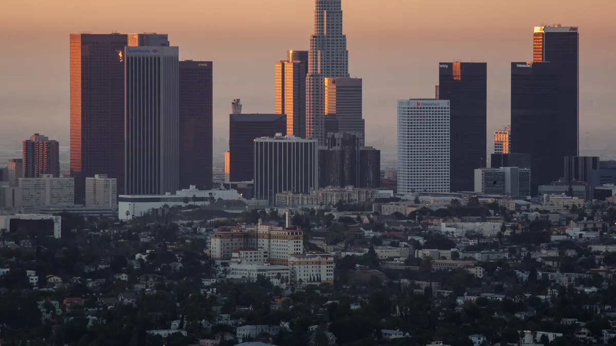 A view of the Los Angeles skyline in early morning haze.