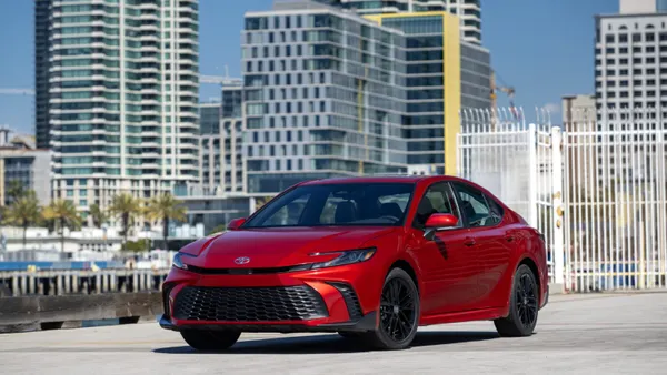2026 Toyota Camry SE AWD in Supersonic Red