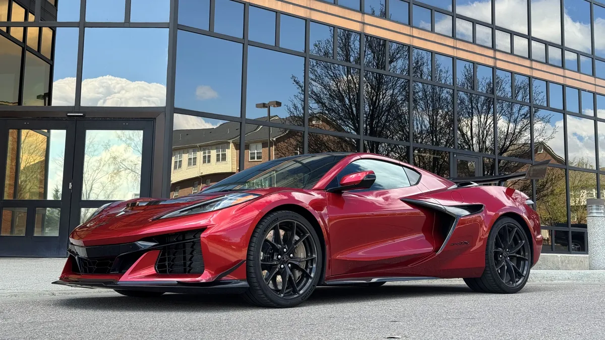 The 2026 Chevrolet Corvette ZR1X sits in a parking lot.
