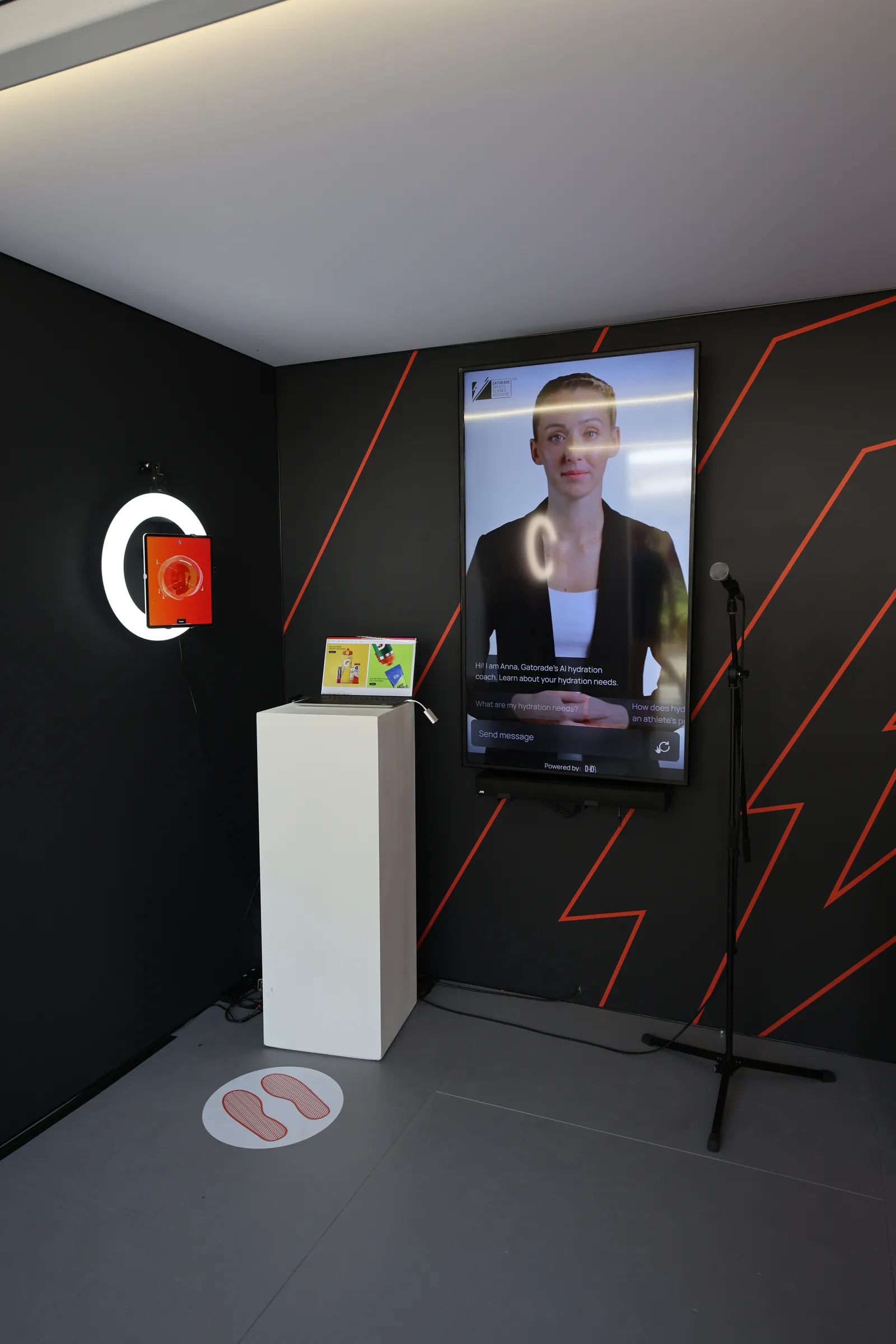 A station at Cannes Lion with a touch screen showing of Gatorade&#x27;s AI Hydration Coach.