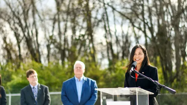 A person speaks at an event.