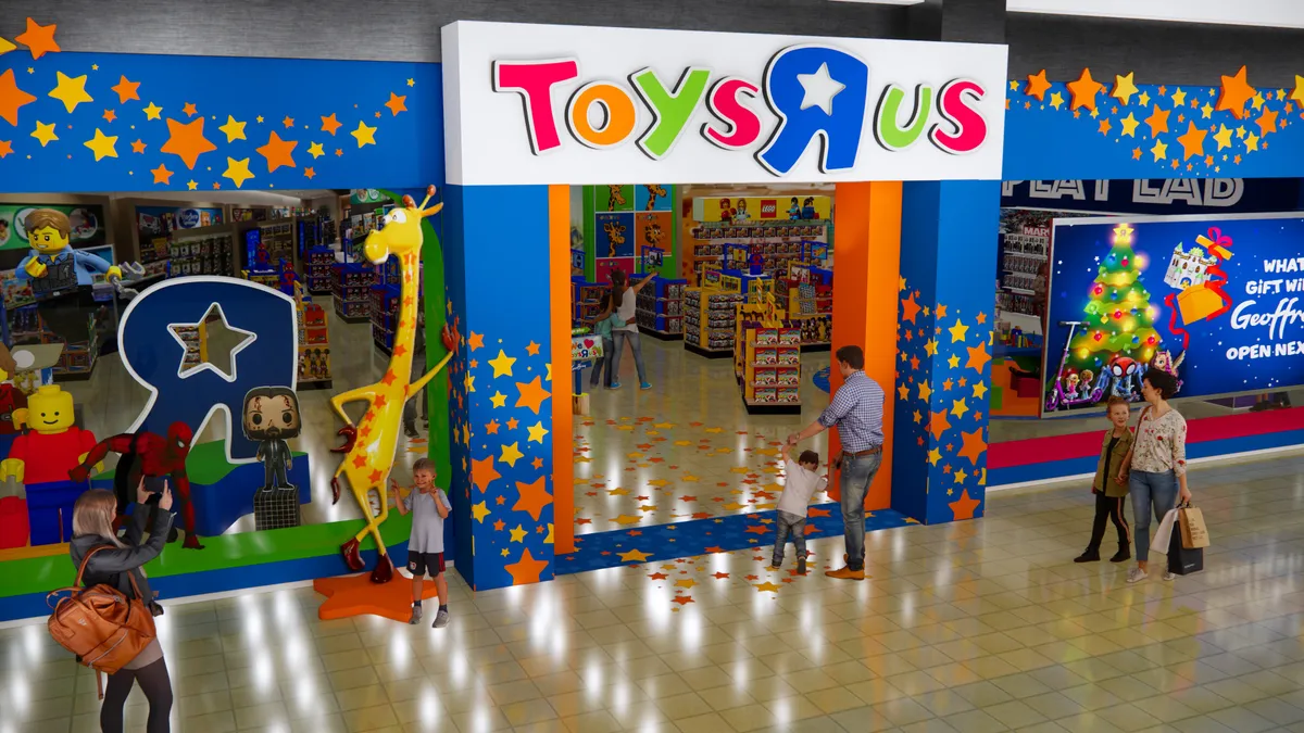 The storefront of a new flagship Toys R Us store with a blue and orange color scheme