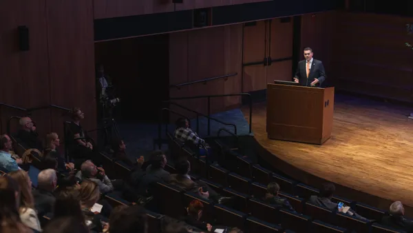 Corporate Energy Buyers Association CEO Rich Powell standing at a podium at DC Climate Week 2026