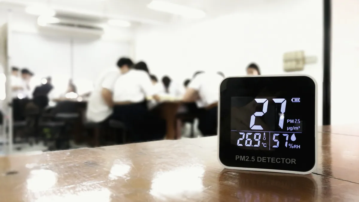 An indoor air quality monitor in a classroom.