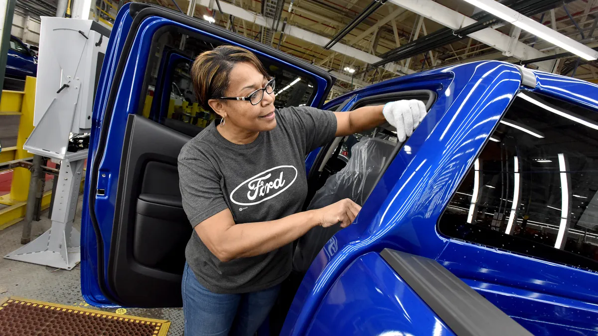 A worker on the assembly line at Ford's Michigan Assembly Plant.