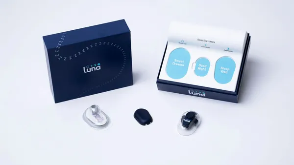 A box says Luna on the front, with three oval-shaped components in front of it.