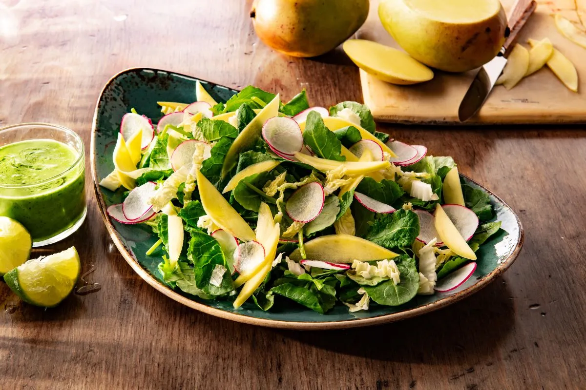 A photograph of Fogo de Chao's baby kale and mango salad.