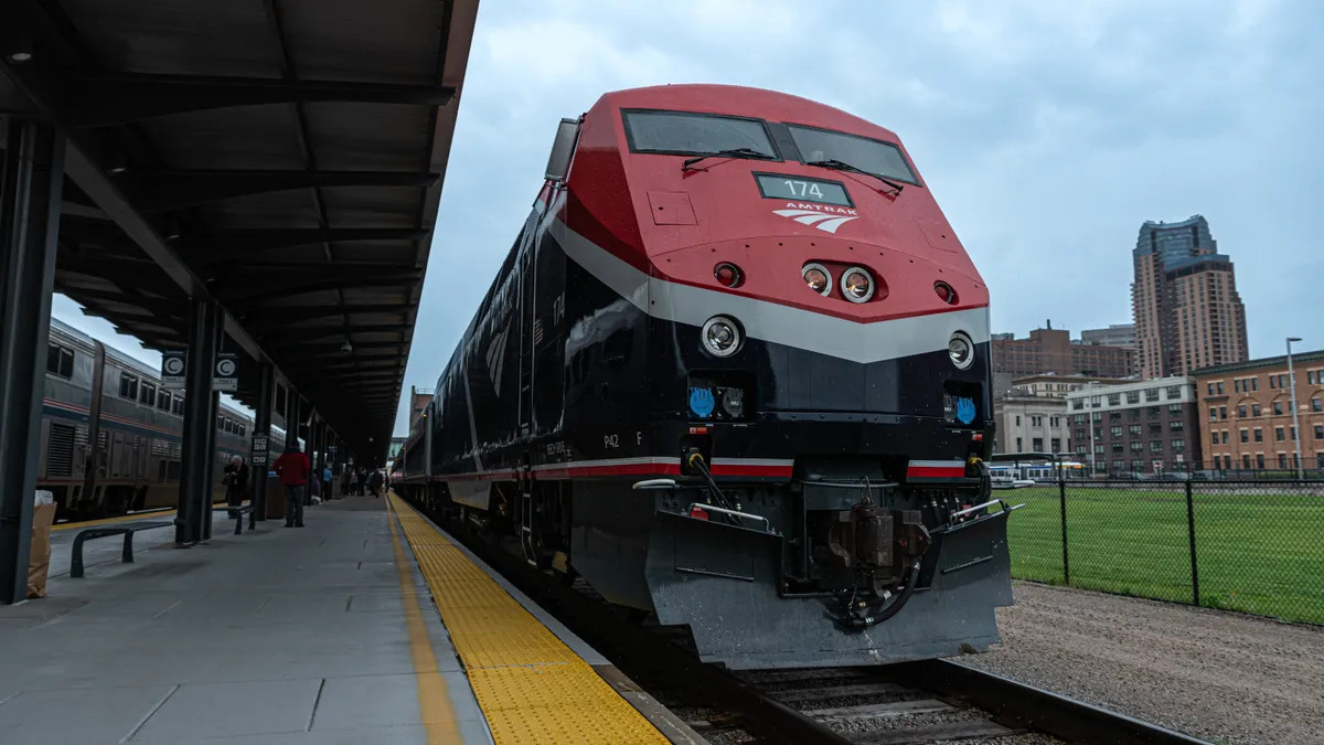 Amtrak trains at a station.