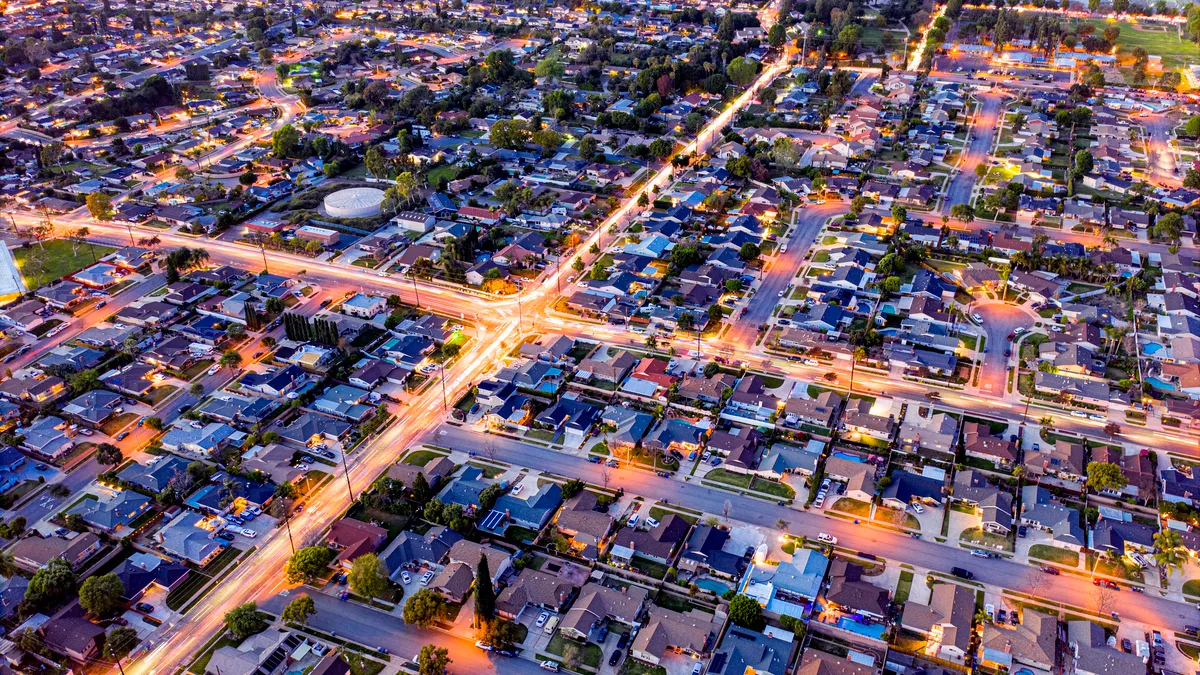 California suburbs at night from a drone point of view.