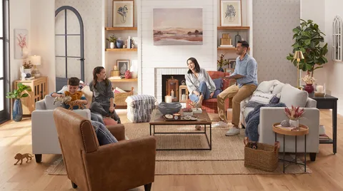 A group of people gathered in a living room