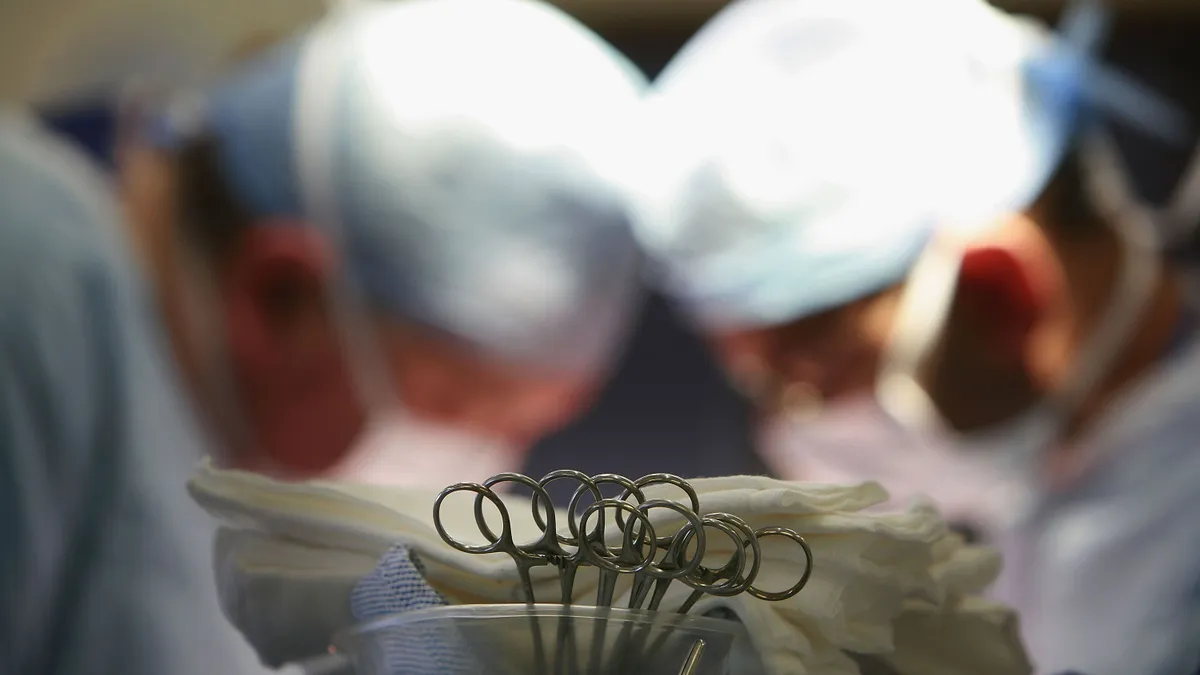 Surgeons perform operation on patient