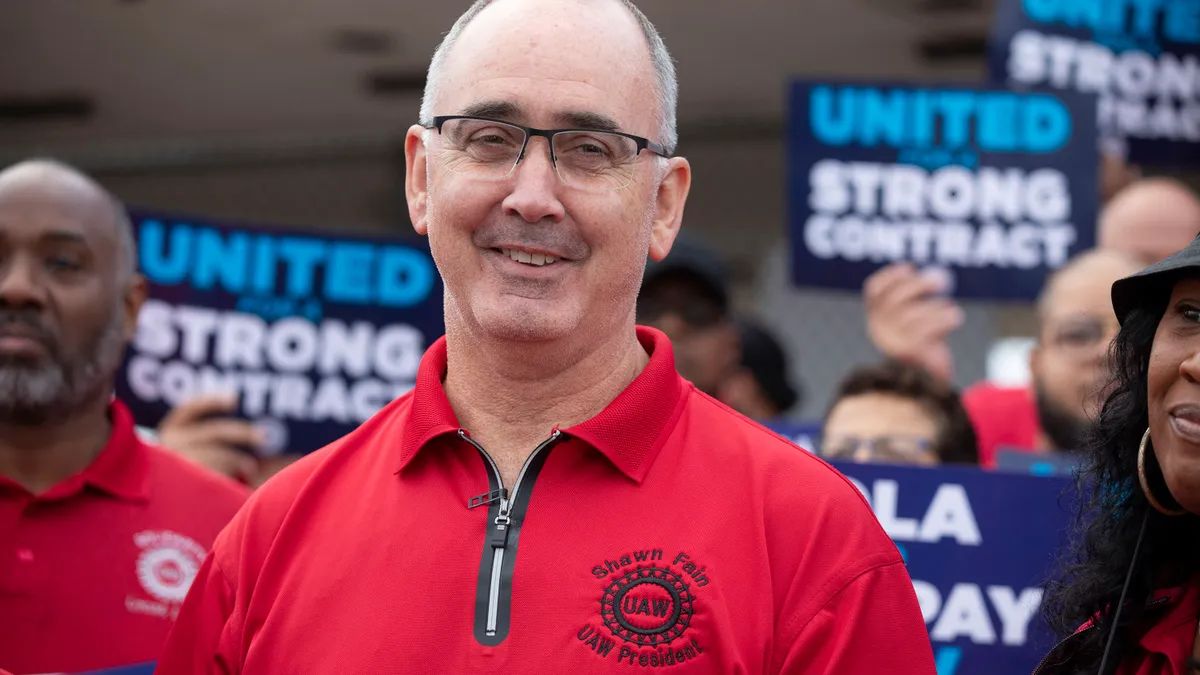 Picture of United Auto Workers president Shawn Fain at a Stellantis assembly plant.