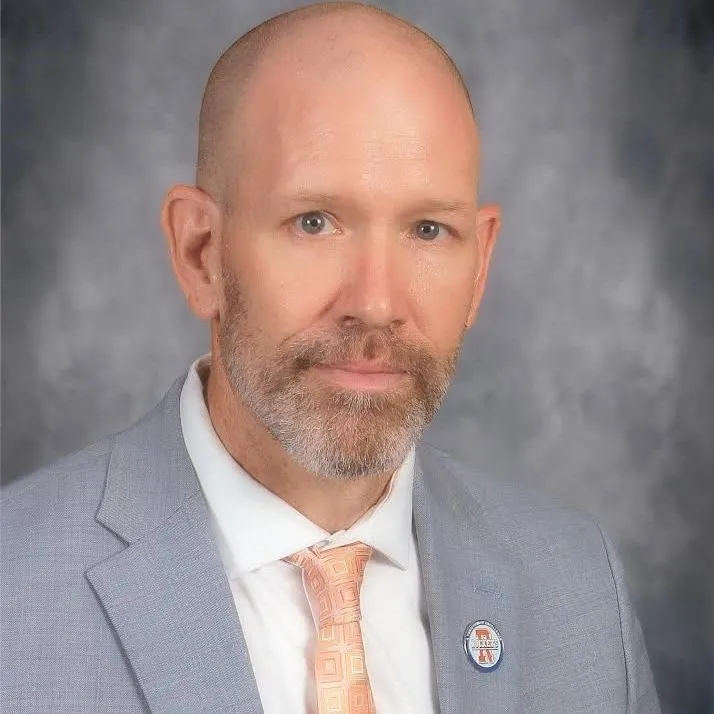 This is a headshot of Dan Cox, superintendent of Rochester CUSD 3A in Rochester, Illinois, and a member of the Institute for Education Innovation.