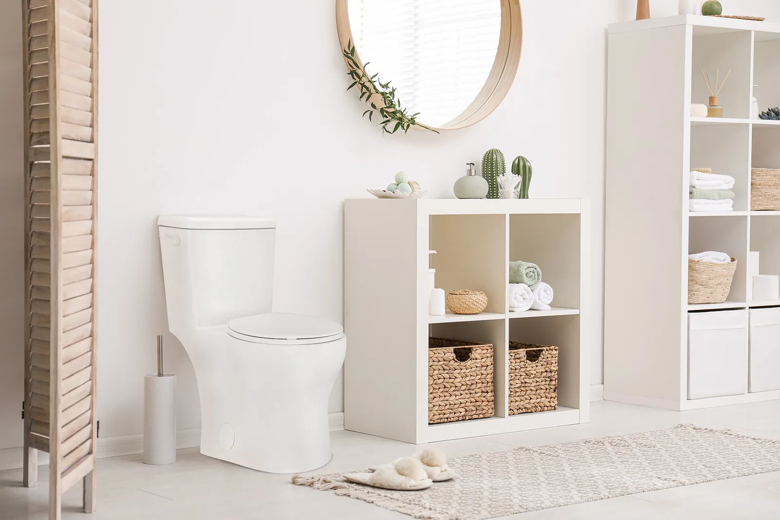 A bathroom decorated in white and beige.