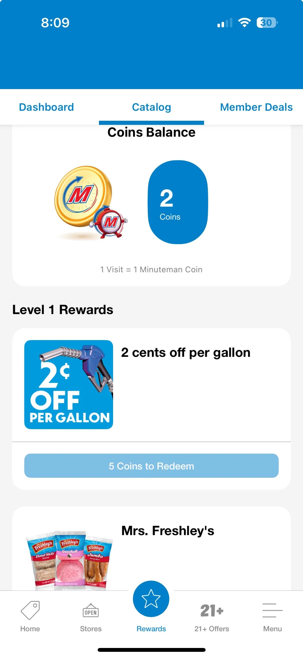 A screenshot of a phone showing an app. A menu at the top days "Dashboard. Catalog. Member deals." Text further down the screen says "Coins Balance, Level 1 Rewards."