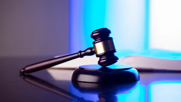 Wooden brown gavel on the table