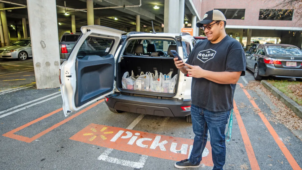 A Roadie driver logs a pickup.