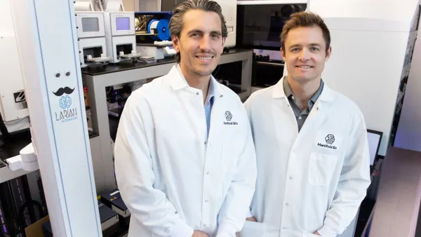 Two of Manifold Bio's co-founders, Pierce Ogden and Gleb Kuznetsov, pose in the company's labs.
