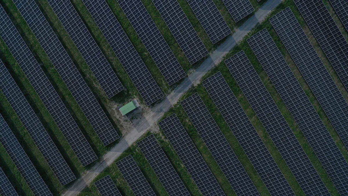 In this aerial view solar panels stand at the Klettwitz Nord solar energy park on May 04, 2023 near Klettwitz, Germany.