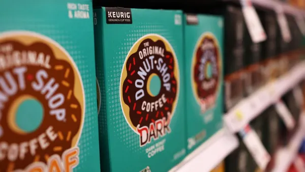 Boxes of Keurig cups on a store shelf.