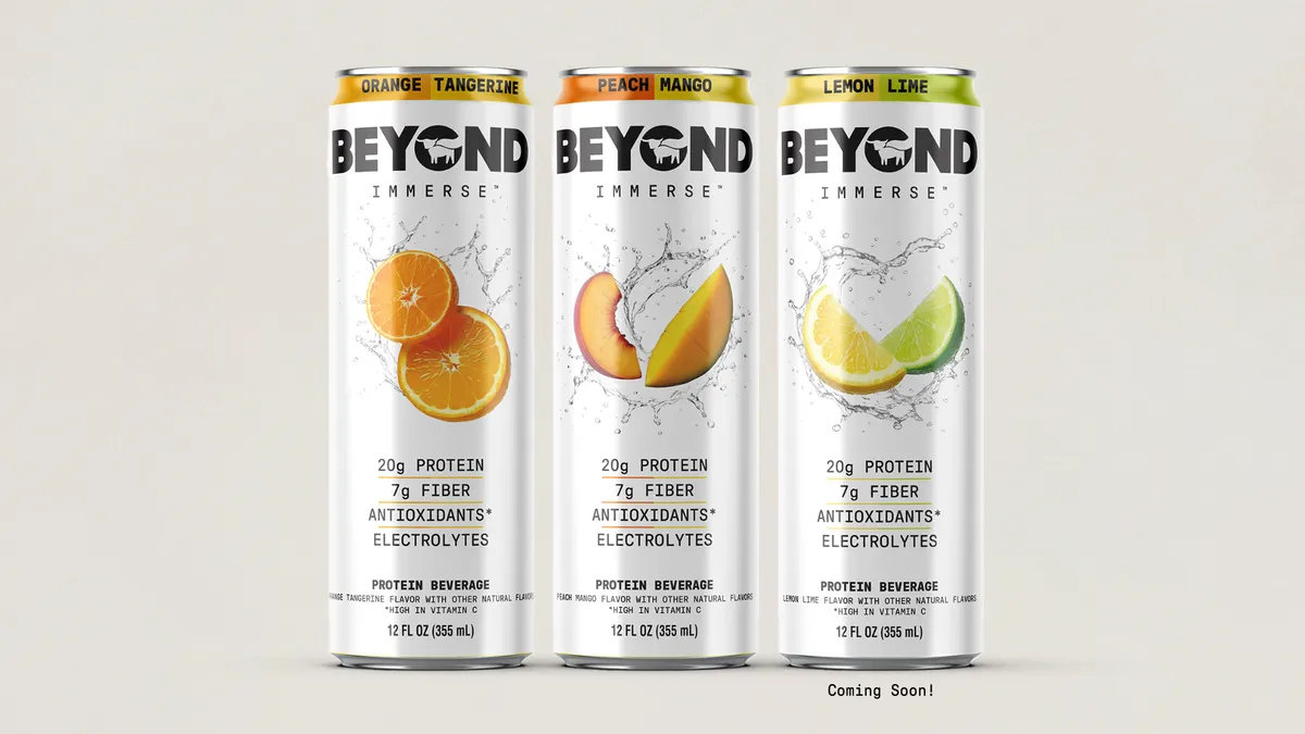 Three cans of Beyond Immerse are pictured, each can featuring images of fruits including oranges, peaches, lemons and limes.