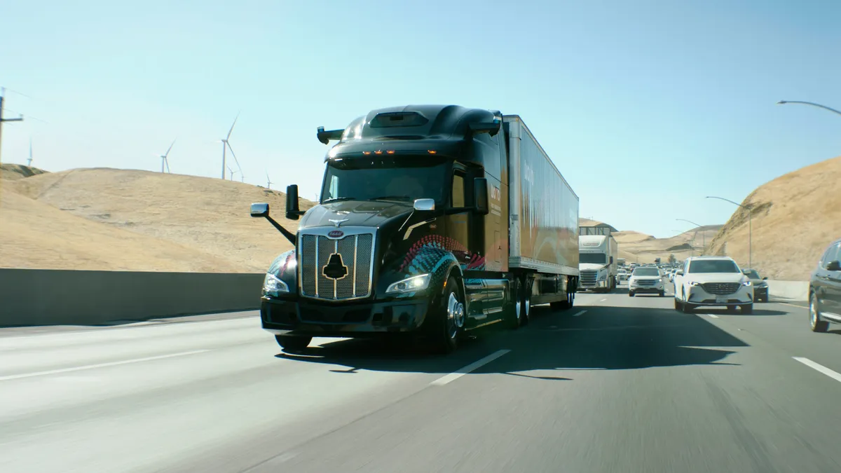 A Waabi self-driving truck on the road.