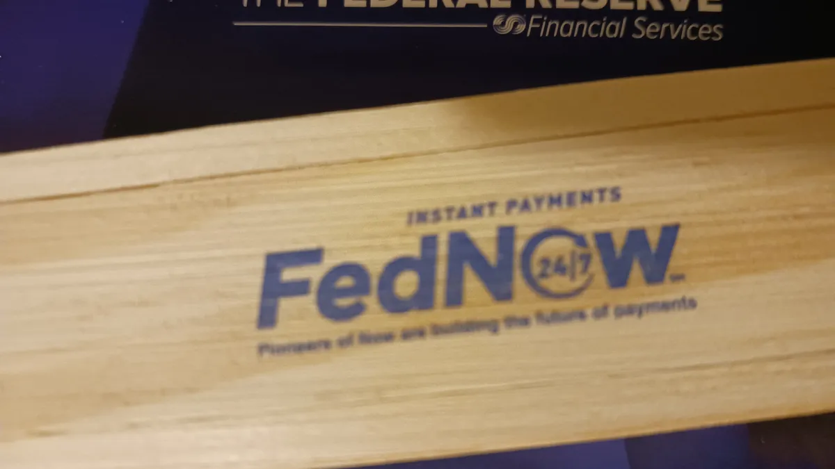 Small wooden box swag from Fed with FedNow logo.