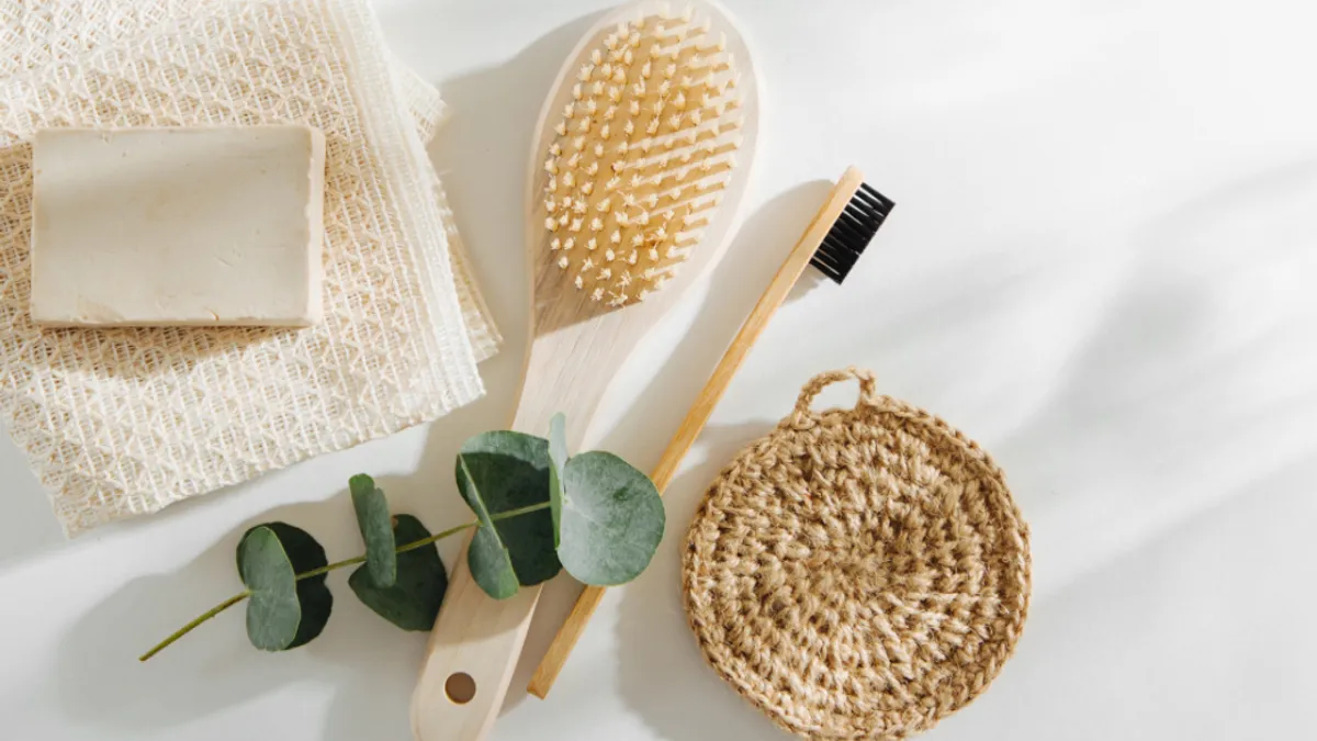 Soap bar, hair brush, and toothbrush on the countertop