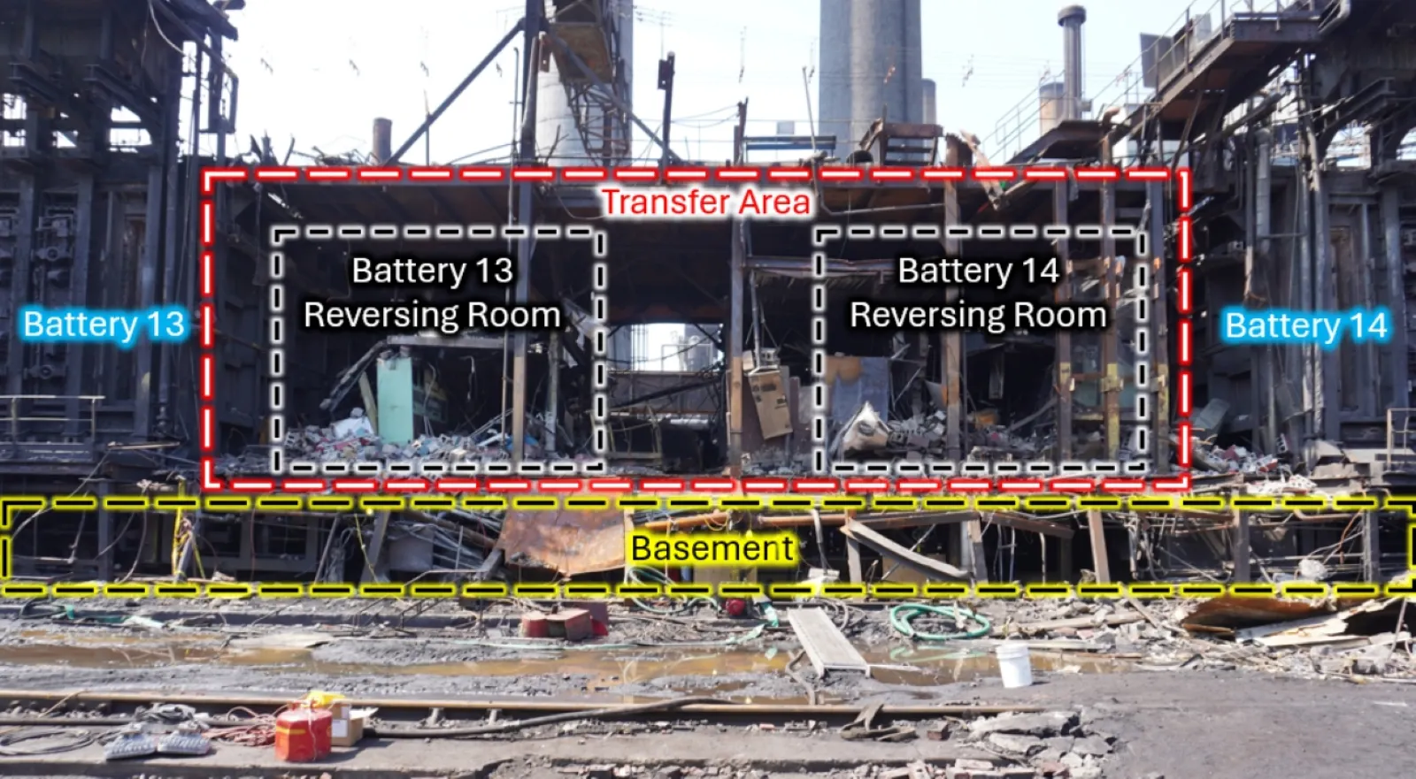 A damage outdoor facility with four dotted boxes shaped as squares adjacent from each other.