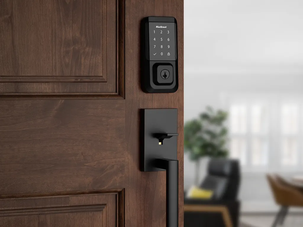 A lock and number pad above a door handle.