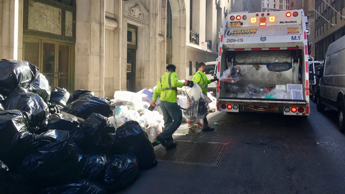 DSNY workers collecting waste in New York