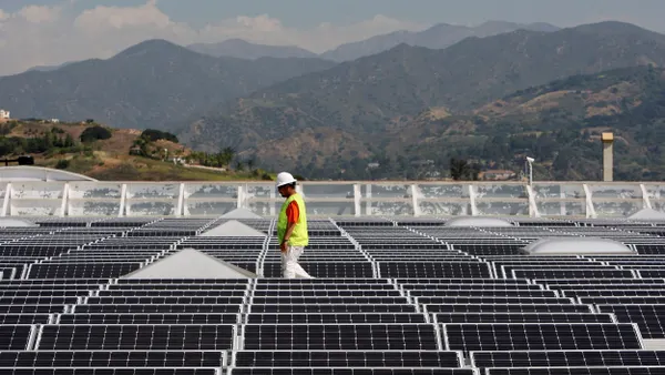 Solar panels cover the roof of a Sam's Club store.