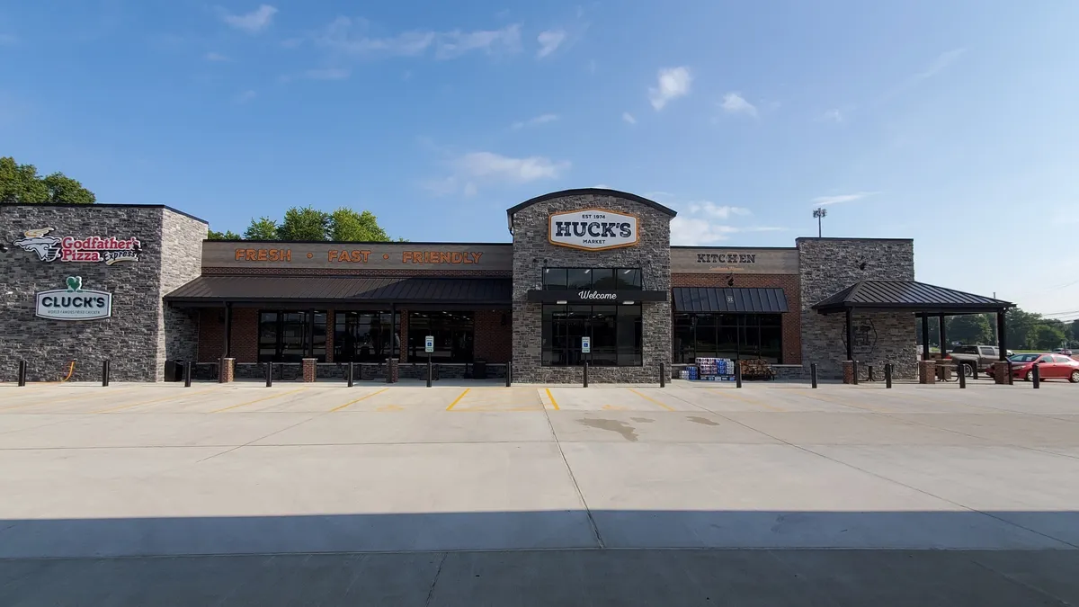 A photo of the exterior of a Huck's location.