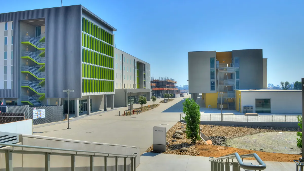 A photo shows the expanded campus of University of California Merced.