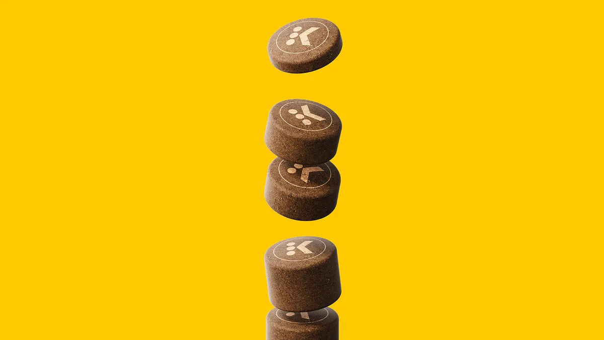 Coffee K-Rounds fall against a yellow backdrop.