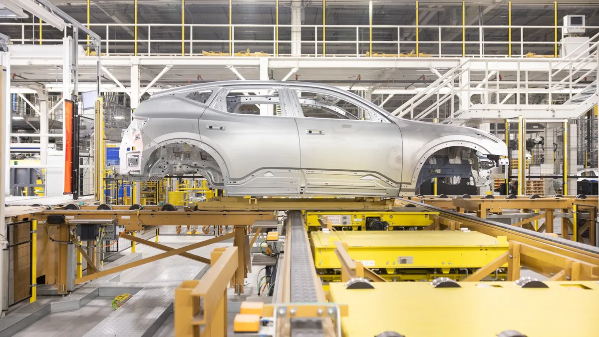 An electric vehicle on an assembly line