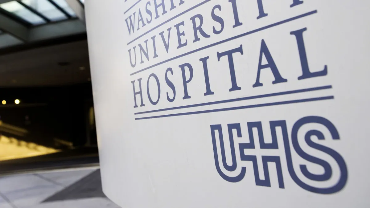 The sign in front of George Washington University Hospital, beside UHS' logo